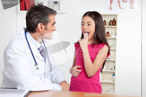 Image of Girl Using Asthma Inhaler