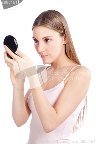 Image of Woman Looking at Compact Mirror