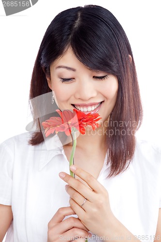 Image of Woman Holding Gerbera Flower