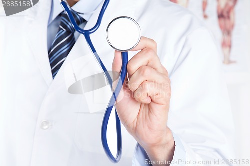 Image of Male Doctor Holding Stethoscope