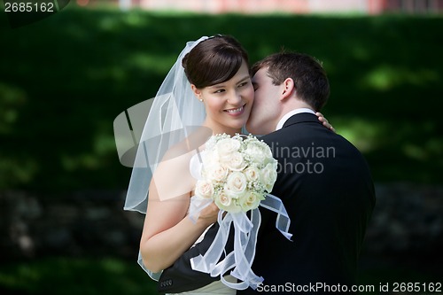 Image of Newlywed Couple Kissing