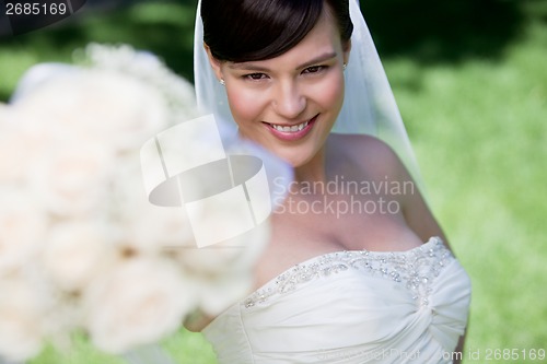 Image of Bride Showing Off Her Flower Bouquet