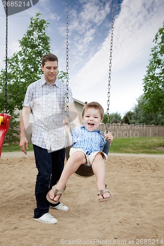 Image of Father and Son at Playground