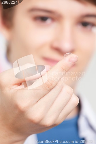 Image of Optometrist Holding Contact Lens