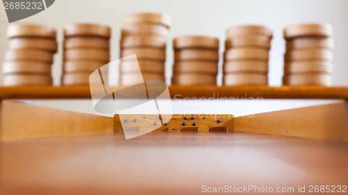 Image of Typical dutch wooden boardgame - Sjoelen