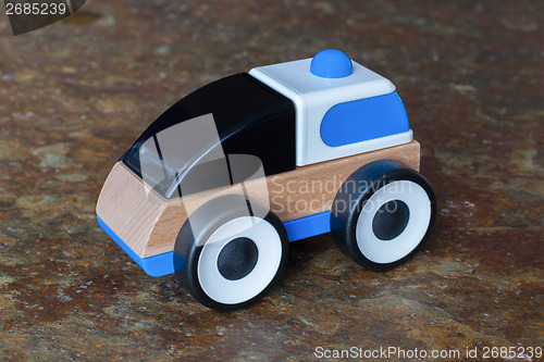 Image of Simple wood and plastic toy police car
