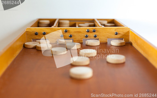 Image of Typical dutch wooden boardgame - Sjoelen