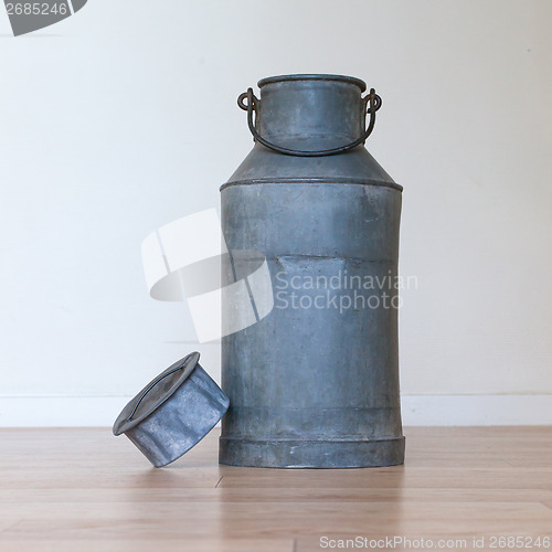 Image of Old metal milk can