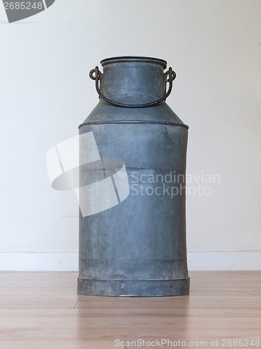 Image of Old metal milk can