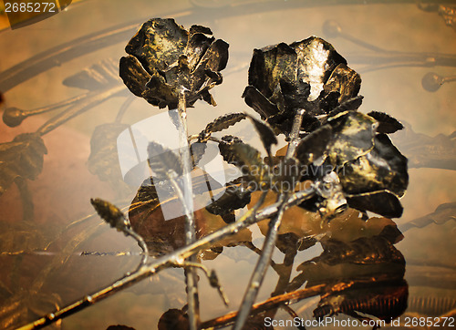 Image of The shiny metal forged roses, handmade