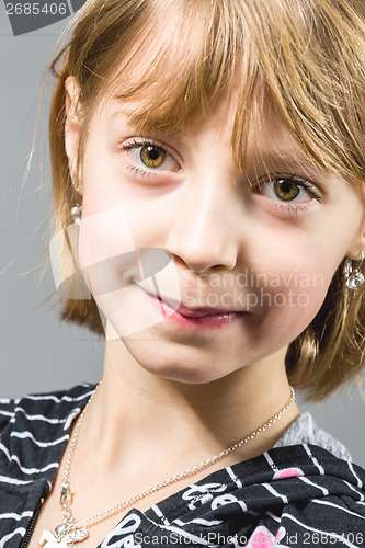 Image of Studio portrait of young beautiful girl