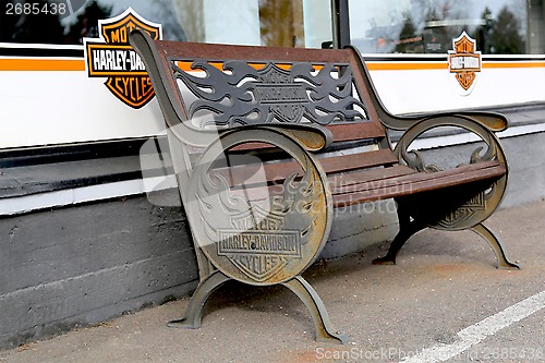 Image of Vintage Bench with Harley-Davidson Motorcycles Signage