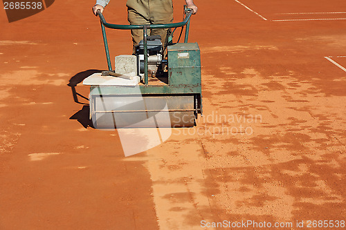 Image of Rolling a tennis court_1