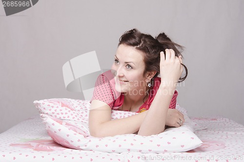 Image of The young beautiful girl wants in bed