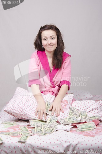 Image of Girl in bed unexpectedly received an inheritance