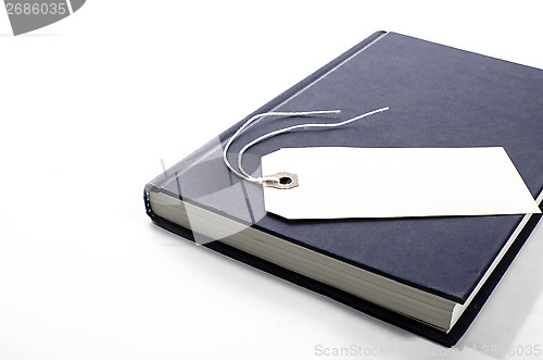 Image of A book with a blank tag