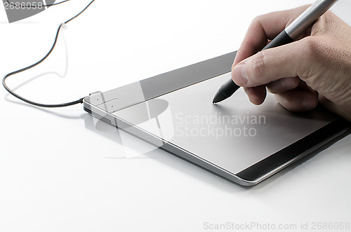 Image of Hand writing on a touch pad