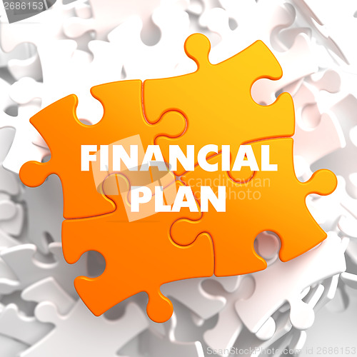 Image of Financial Plan on Orange Puzzle.