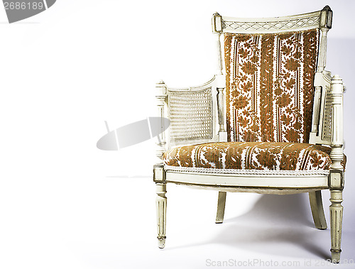 Image of Antique chair against white background.