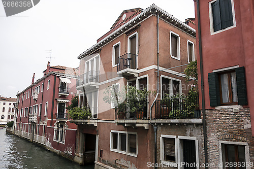 Image of old colorful brick houses in Venice