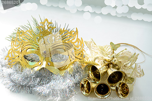 Image of Carnival mask and golden bells