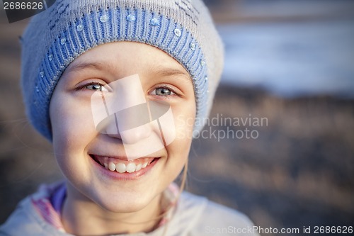 Image of Outdoor portrait of a cute little girl