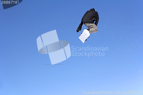 Image of Snowboarder jumping