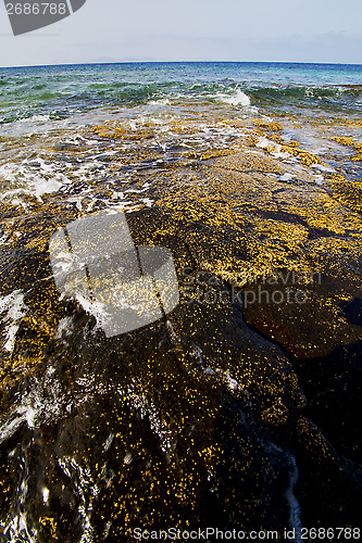Image of cloudy     isle foam rock spain landscape  stone sky   