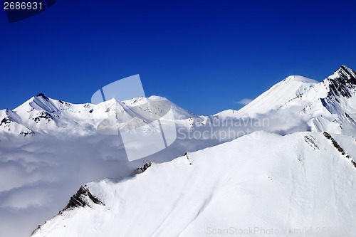 Image of Mountains in clouds at nice nice day