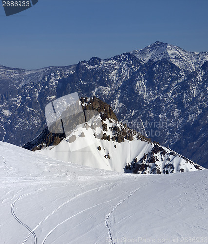 Image of Trace from ski and snowboards on off-piste slope