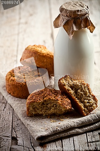 Image of bottle of milk and fresh baked bread 