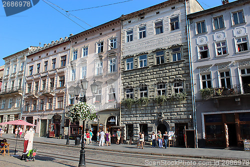 Image of street in Lvov with people having a rest