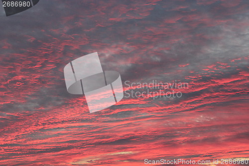 Image of landscape with beautiful sunset and red clouds