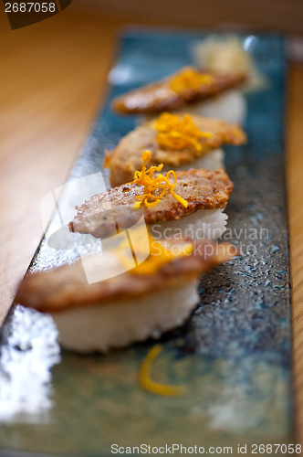 Image of Japanese style sushi fried goose liver