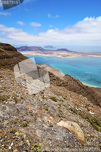 Image of  del rio harbor rock stone yacht water  in lanzarote  