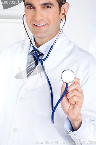 Image of Male Doctor Holding Stethoscope