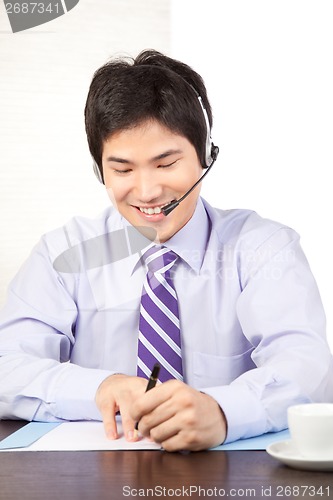 Image of Businessman Wearing a Headset