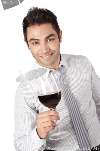 Image of Businessman Holding Red Wine Glass