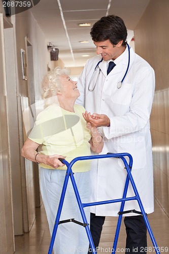 Image of Doctor and Woman with Zimmerframe