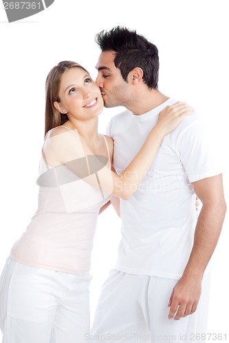 Image of Young Man Kissing Young Woman