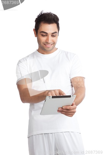 Image of Man Using Digital Tablet
