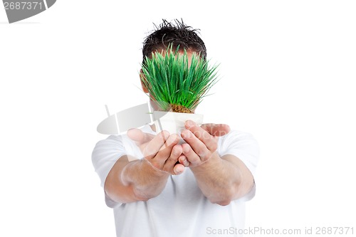 Image of Man Holding Potted Plant