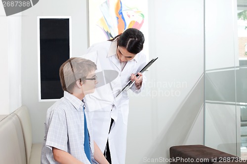 Image of Female Optometrist and Patient