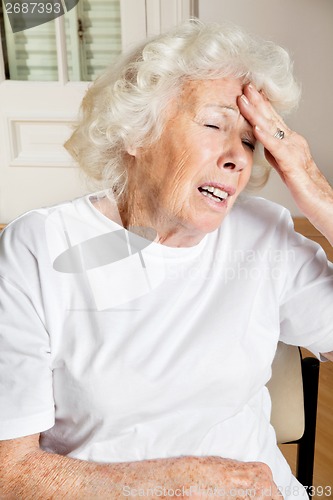 Image of Senior Woman Suffering From Headache
