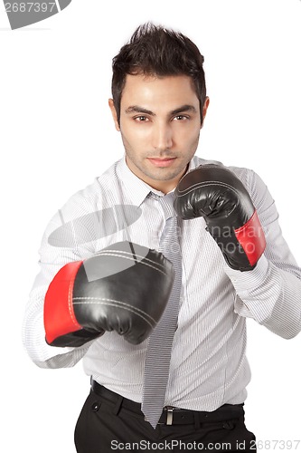 Image of Businessman Wearing Boxing Gloves