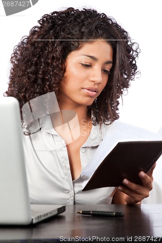 Image of Businesswoman Working at Work