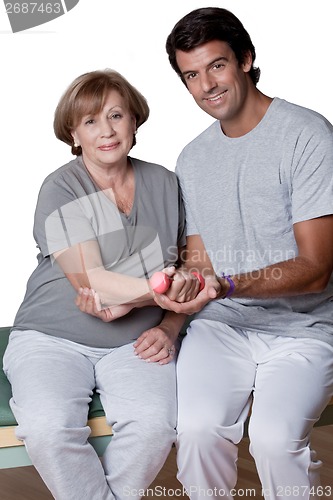 Image of Physical Therapist helping a Patient