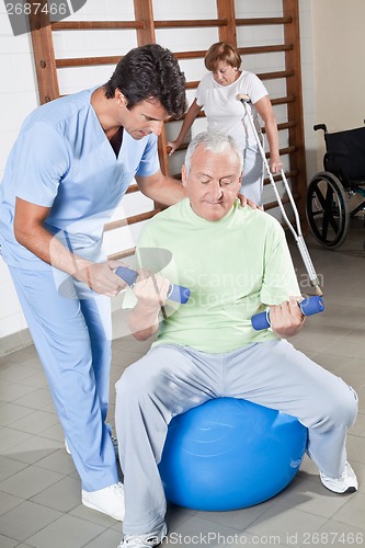 Image of Physical Therapist helping a Patient