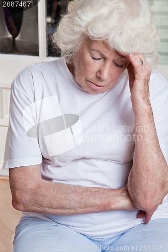 Image of Senior Woman having Headache