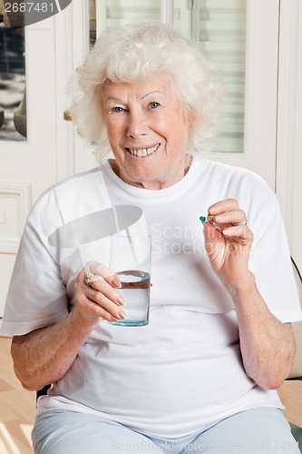 Image of Woman Taking her Medicine